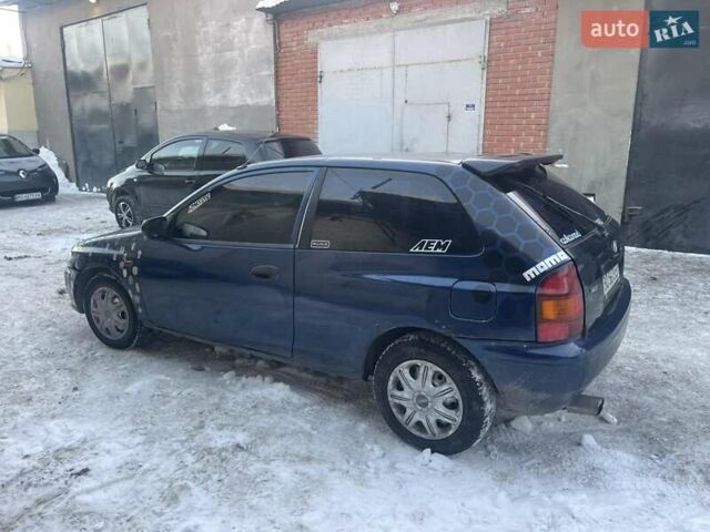 Синій Мазда 323, об'ємом двигуна 1.32 л та пробігом 250 тис. км за 850 $, фото 8 на Automoto.ua