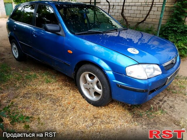 Синій Мазда 323, об'ємом двигуна 1.5 л та пробігом 300 тис. км за 550 $, фото 2 на Automoto.ua