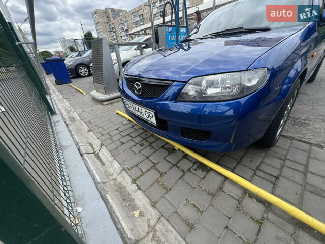 Синий Мазда 323, объемом двигателя 1.6 л и пробегом 172 тыс. км за 3600 $, фото 6 на Automoto.ua