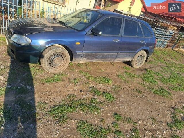 Синій Мазда 323, об'ємом двигуна 1.6 л та пробігом 223 тис. км за 1100 $, фото 1 на Automoto.ua