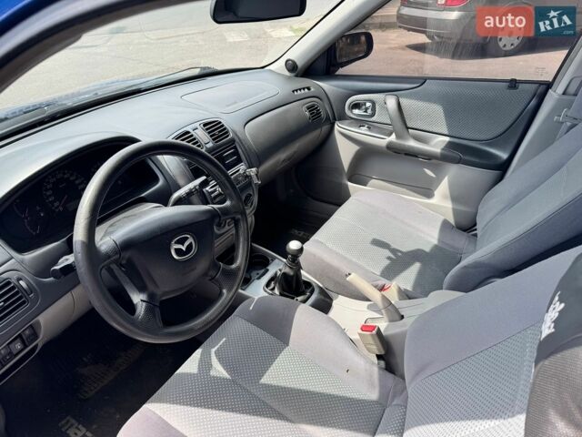 Синий Мазда 323, объемом двигателя 1.6 л и пробегом 176 тыс. км за 2900 $, фото 5 на Automoto.ua