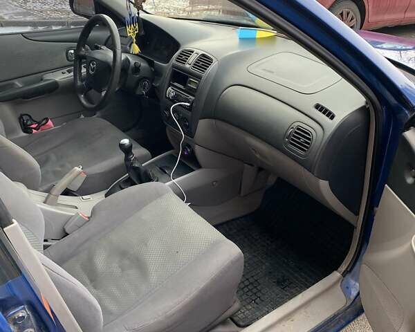 Синій Мазда 323, об'ємом двигуна 1.6 л та пробігом 200 тис. км за 2850 $, фото 5 на Automoto.ua