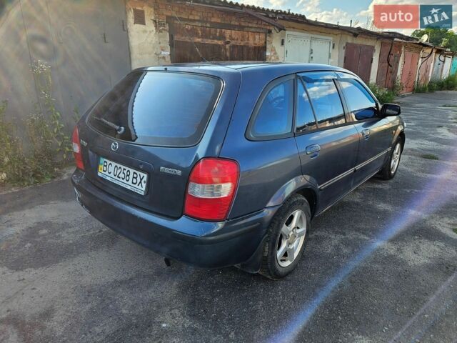 Синий Мазда 323, объемом двигателя 1.8 л и пробегом 238 тыс. км за 2400 $, фото 5 на Automoto.ua