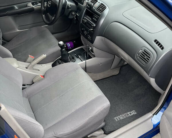 Синий Мазда 323, объемом двигателя 1.6 л и пробегом 172 тыс. км за 3600 $, фото 10 на Automoto.ua