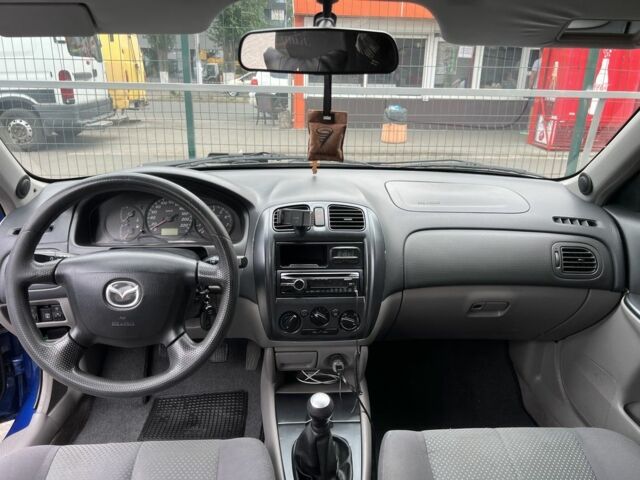 Синій Мазда 323, об'ємом двигуна 1.6 л та пробігом 172 тис. км за 3600 $, фото 11 на Automoto.ua