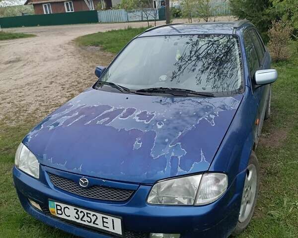 Синій Мазда 323, об'ємом двигуна 1.5 л та пробігом 410 тис. км за 1800 $, фото 14 на Automoto.ua