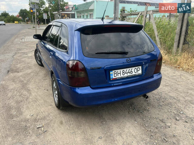 Синий Мазда 323, объемом двигателя 1.6 л и пробегом 172 тыс. км за 3600 $, фото 2 на Automoto.ua
