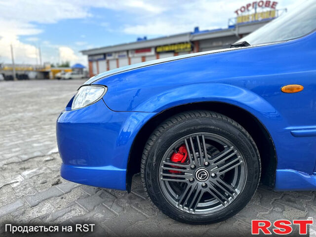 Синий Мазда 323, объемом двигателя 2 л и пробегом 300 тыс. км за 3000 $, фото 6 на Automoto.ua