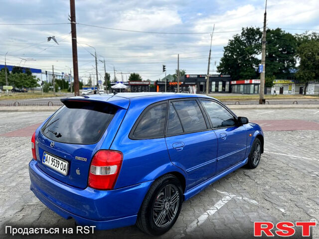 Синий Мазда 323, объемом двигателя 2 л и пробегом 300 тыс. км за 3000 $, фото 5 на Automoto.ua