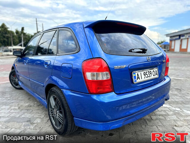 Синий Мазда 323, объемом двигателя 2 л и пробегом 300 тыс. км за 3000 $, фото 4 на Automoto.ua