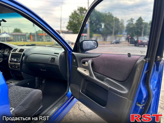 Синий Мазда 323, объемом двигателя 2 л и пробегом 300 тыс. км за 3000 $, фото 12 на Automoto.ua