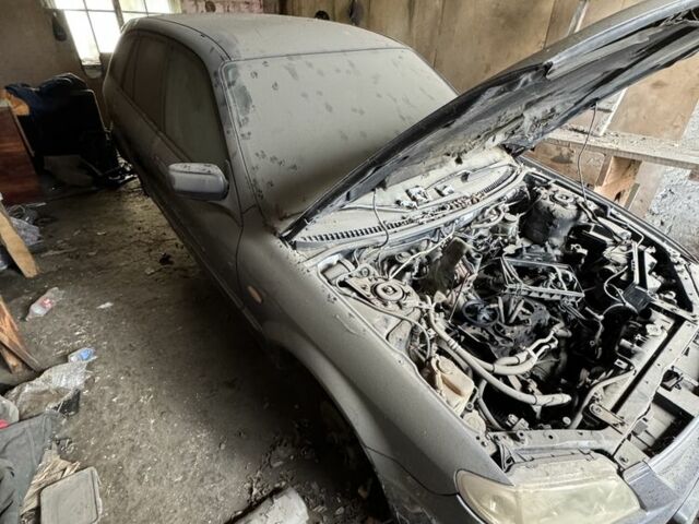 Синий Мазда 323, объемом двигателя 0 л и пробегом 200 тыс. км за 500 $, фото 7 на Automoto.ua