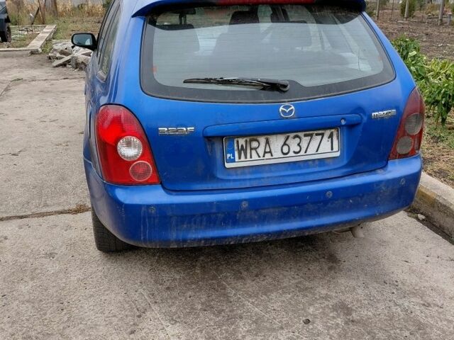 Синій Мазда 323, об'ємом двигуна 2 л та пробігом 300 тис. км за 750 $, фото 3 на Automoto.ua