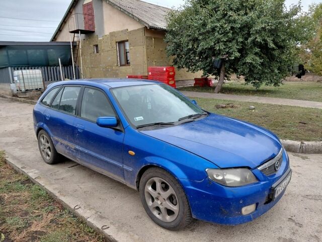 Синій Мазда 323, об'ємом двигуна 2 л та пробігом 300 тис. км за 750 $, фото 2 на Automoto.ua
