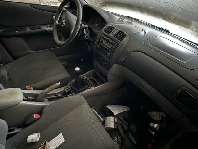 Синий Мазда 323, объемом двигателя 0 л и пробегом 200 тыс. км за 500 $, фото 6 на Automoto.ua