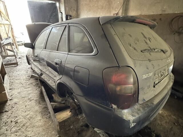 Синий Мазда 323, объемом двигателя 0 л и пробегом 200 тыс. км за 500 $, фото 4 на Automoto.ua