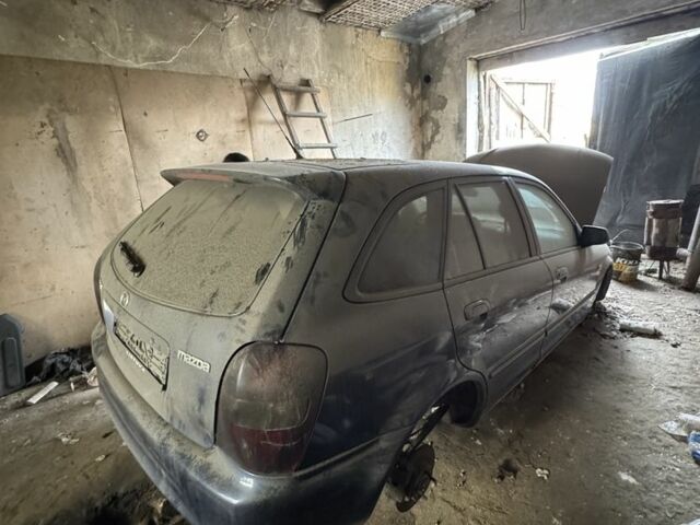 Синий Мазда 323, объемом двигателя 0 л и пробегом 200 тыс. км за 500 $, фото 5 на Automoto.ua