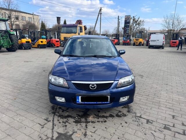 Синій Мазда 323, об'ємом двигуна 2 л та пробігом 259 тис. км за 1700 $, фото 1 на Automoto.ua