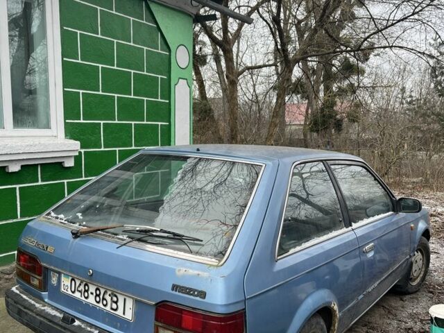 Синий Мазда 323, объемом двигателя 1.5 л и пробегом 293 тыс. км за 400 $, фото 1 на Automoto.ua