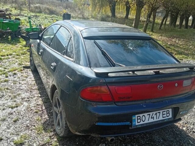 Синий Мазда 323, объемом двигателя 1.5 л и пробегом 200 тыс. км за 2125 $, фото 2 на Automoto.ua
