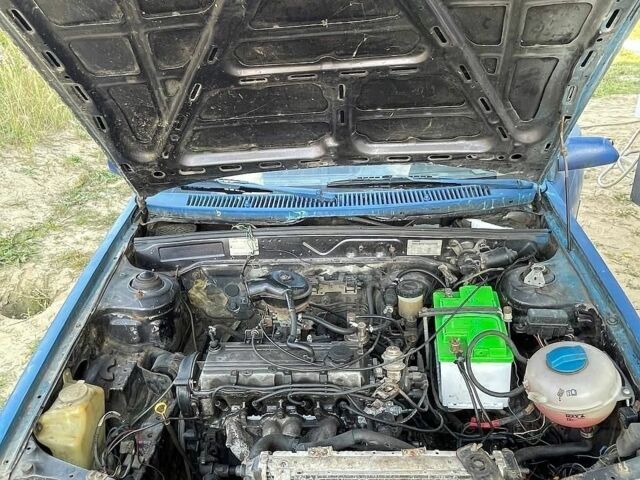 Синій Мазда 323, об'ємом двигуна 1.3 л та пробігом 215 тис. км за 700 $, фото 9 на Automoto.ua