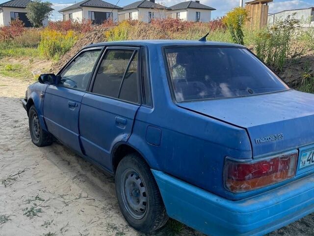 Синій Мазда 323, об'ємом двигуна 1.3 л та пробігом 215 тис. км за 700 $, фото 5 на Automoto.ua