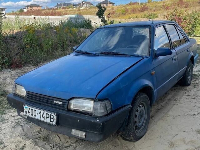 Синій Мазда 323, об'ємом двигуна 1.3 л та пробігом 215 тис. км за 700 $, фото 3 на Automoto.ua