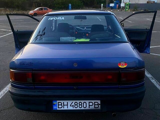 Синій Мазда 323, об'ємом двигуна 1.3 л та пробігом 0 тис. км за 1200 $, фото 4 на Automoto.ua