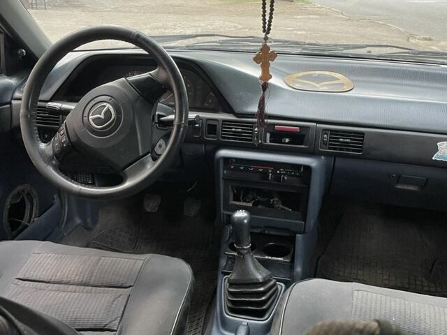 Синий Мазда 323, объемом двигателя 1.6 л и пробегом 3 тыс. км за 1200 $, фото 4 на Automoto.ua