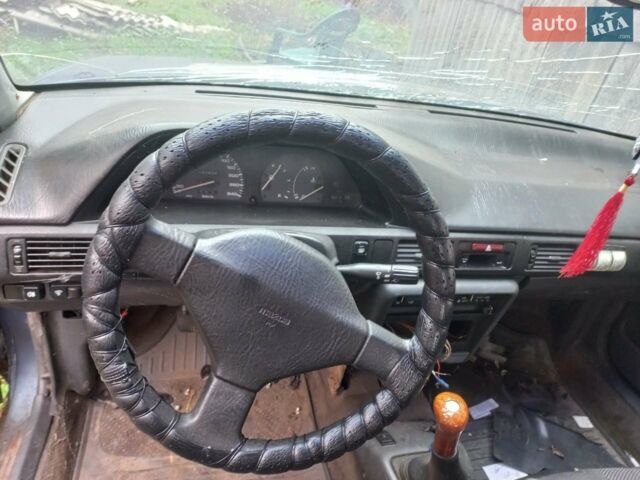 Синий Мазда 323, объемом двигателя 1.3 л и пробегом 240 тыс. км за 400 $, фото 4 на Automoto.ua