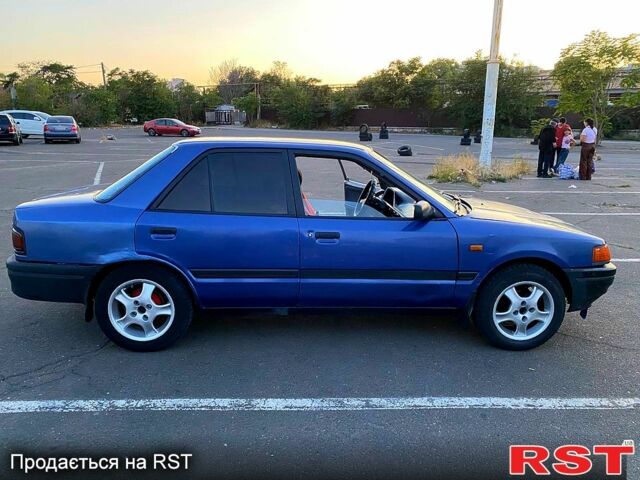Синій Мазда 323, об'ємом двигуна 1.3 л та пробігом 0 тис. км за 1200 $, фото 6 на Automoto.ua
