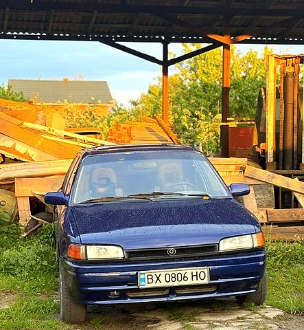 Синий Мазда 323, объемом двигателя 1.6 л и пробегом 220 тыс. км за 1499 $, фото 1 на Automoto.ua