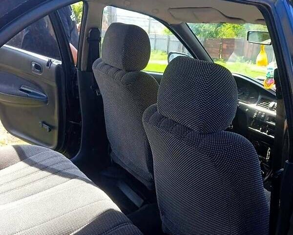 Синий Мазда 323, объемом двигателя 1.3 л и пробегом 429 тыс. км за 2100 $, фото 5 на Automoto.ua