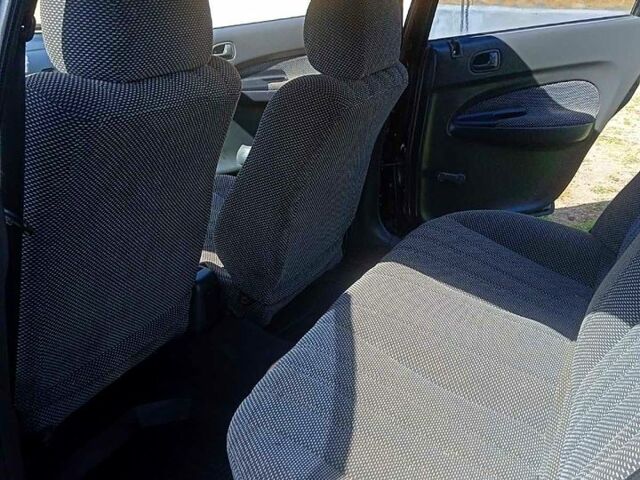 Синий Мазда 323, объемом двигателя 1.3 л и пробегом 429 тыс. км за 2100 $, фото 5 на Automoto.ua