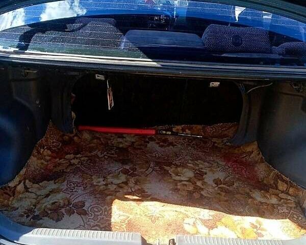 Синий Мазда 323, объемом двигателя 1.3 л и пробегом 429 тыс. км за 2100 $, фото 8 на Automoto.ua