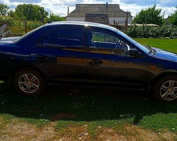 Синий Мазда 323, объемом двигателя 1.3 л и пробегом 429 тыс. км за 2100 $, фото 9 на Automoto.ua