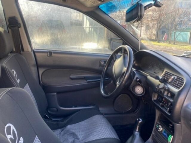 Синий Мазда 323, объемом двигателя 1.5 л и пробегом 3 тыс. км за 1900 $, фото 2 на Automoto.ua