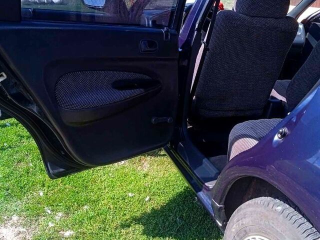 Синий Мазда 323, объемом двигателя 1.3 л и пробегом 429 тыс. км за 2100 $, фото 7 на Automoto.ua