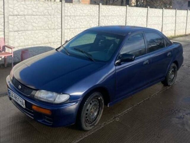 Синій Мазда 323, об'ємом двигуна 1.5 л та пробігом 478 тис. км за 1900 $, фото 3 на Automoto.ua