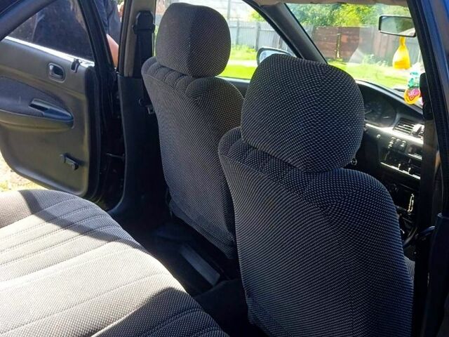 Синий Мазда 323, объемом двигателя 1.3 л и пробегом 429 тыс. км за 2100 $, фото 6 на Automoto.ua