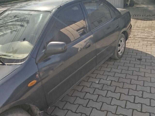 Синий Мазда 323, объемом двигателя 0 л и пробегом 287 тыс. км за 1700 $, фото 4 на Automoto.ua