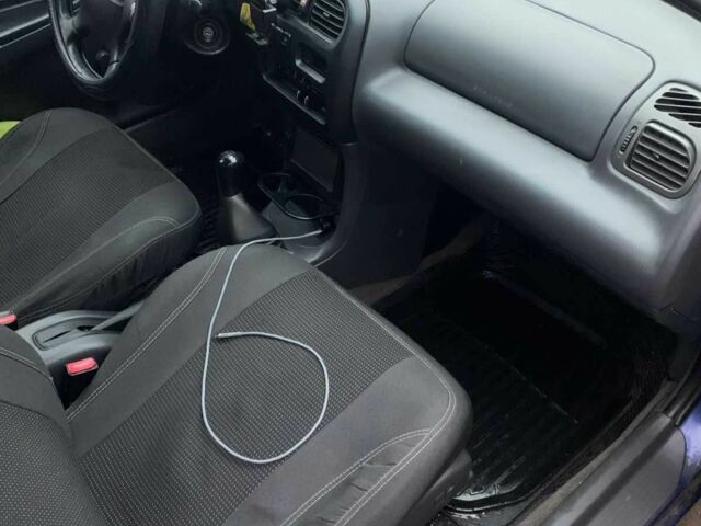 Синий Мазда 323, объемом двигателя 1.5 л и пробегом 419 тыс. км за 2500 $, фото 9 на Automoto.ua