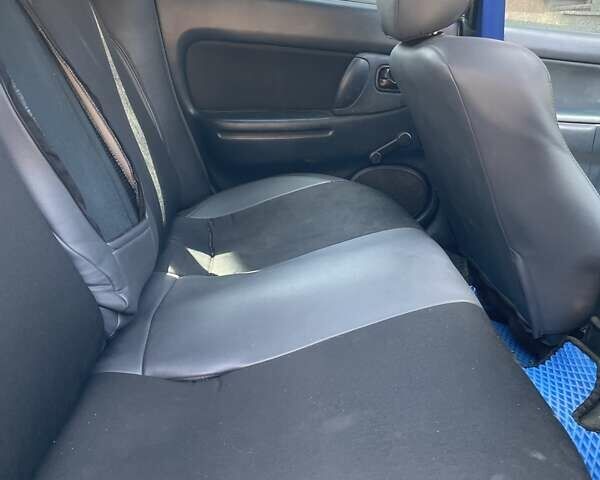 Синий Мазда 323, объемом двигателя 1.49 л и пробегом 415 тыс. км за 2000 $, фото 6 на Automoto.ua