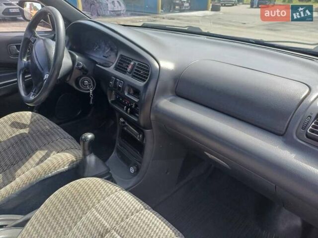 Синий Мазда 323, объемом двигателя 1.5 л и пробегом 295 тыс. км за 2300 $, фото 7 на Automoto.ua