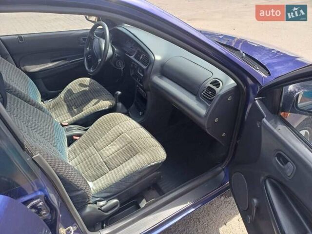 Синий Мазда 323, объемом двигателя 1.5 л и пробегом 295 тыс. км за 2300 $, фото 11 на Automoto.ua