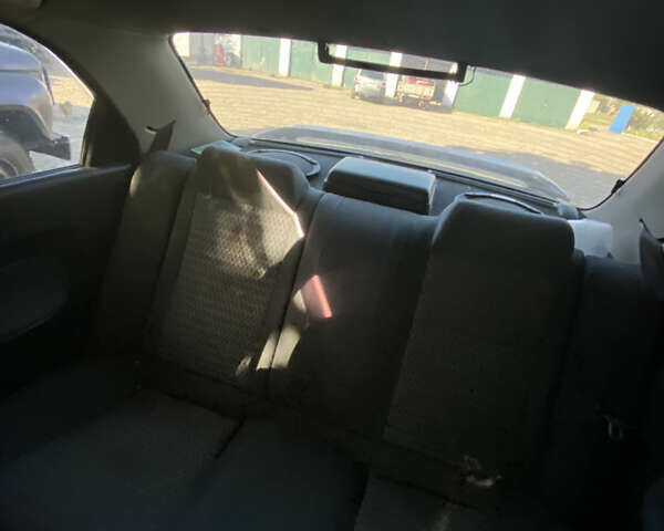 Синій Мазда 323, об'ємом двигуна 1.3 л та пробігом 395 тис. км за 1750 $, фото 9 на Automoto.ua