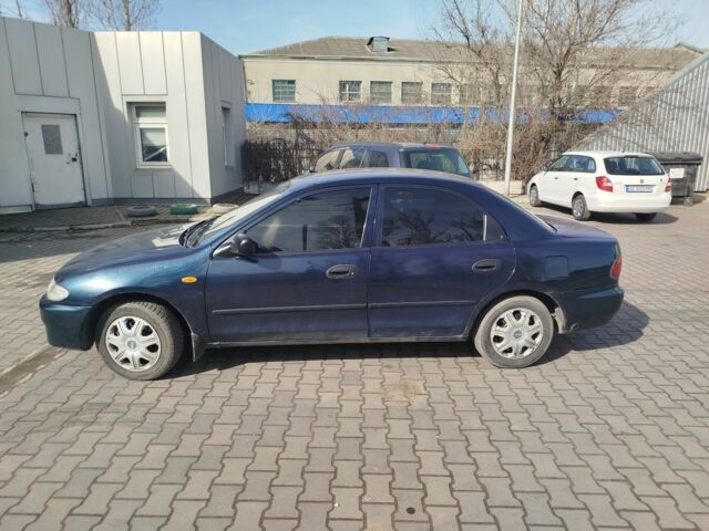 Синий Мазда 323, объемом двигателя 0 л и пробегом 287 тыс. км за 1700 $, фото 7 на Automoto.ua