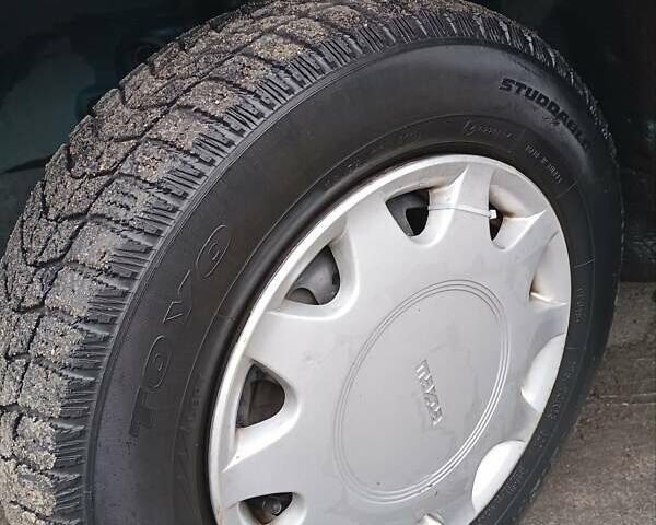 Синий Мазда 323, объемом двигателя 1.6 л и пробегом 159 тыс. км за 3000 $, фото 28 на Automoto.ua