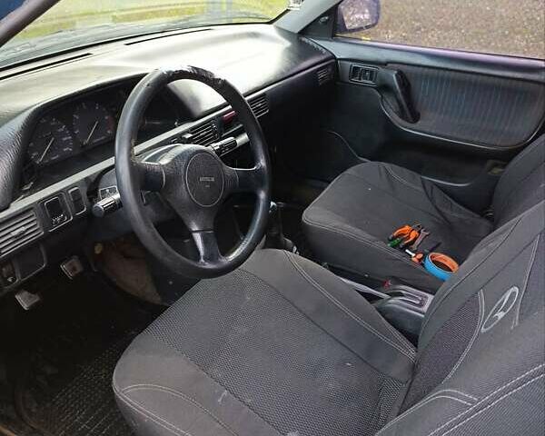 Синий Мазда 323, объемом двигателя 1.69 л и пробегом 250 тыс. км за 750 $, фото 2 на Automoto.ua