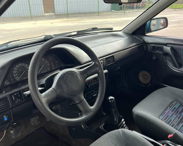 Синий Мазда 323, объемом двигателя 1.6 л и пробегом 250 тыс. км за 1900 $, фото 12 на Automoto.ua